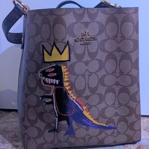 Coach Brown Shoulder Bag with Dinosaur and Crown Design